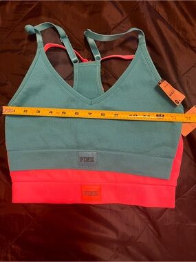 Lot of 2 
Victoria’s Secret PINK 
Pink Active 
Seamless Sports Bras NWT